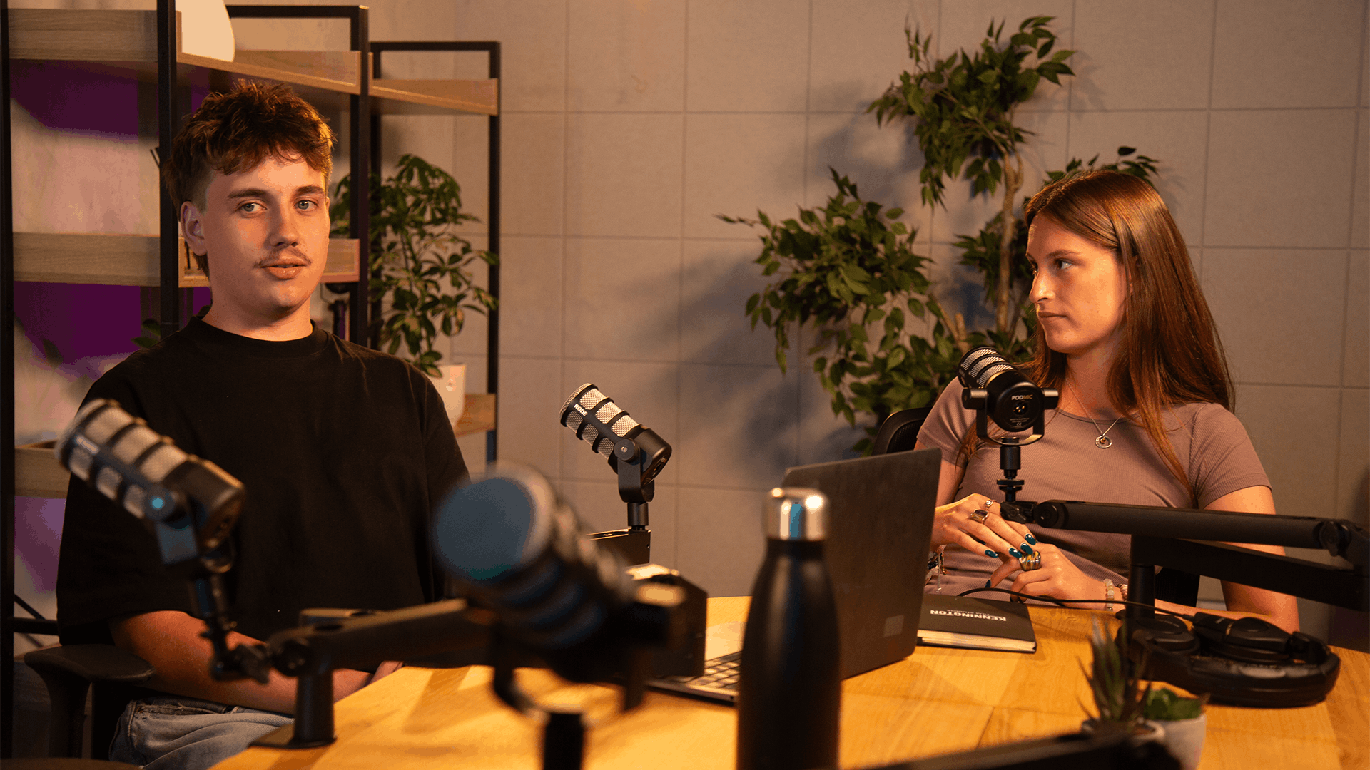 Podcast guests recording together at Kennington Podcast Studios